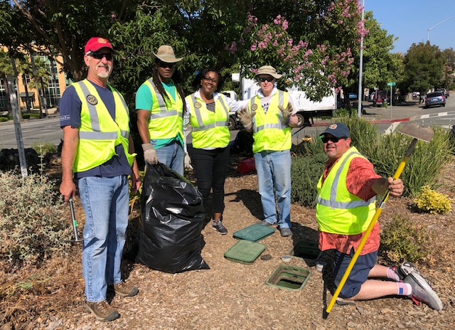 MSRR Members cleaning up Rotary Island at 2nd and Lincoln. 